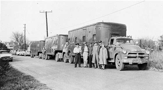 truck-trailers loaded with equipment